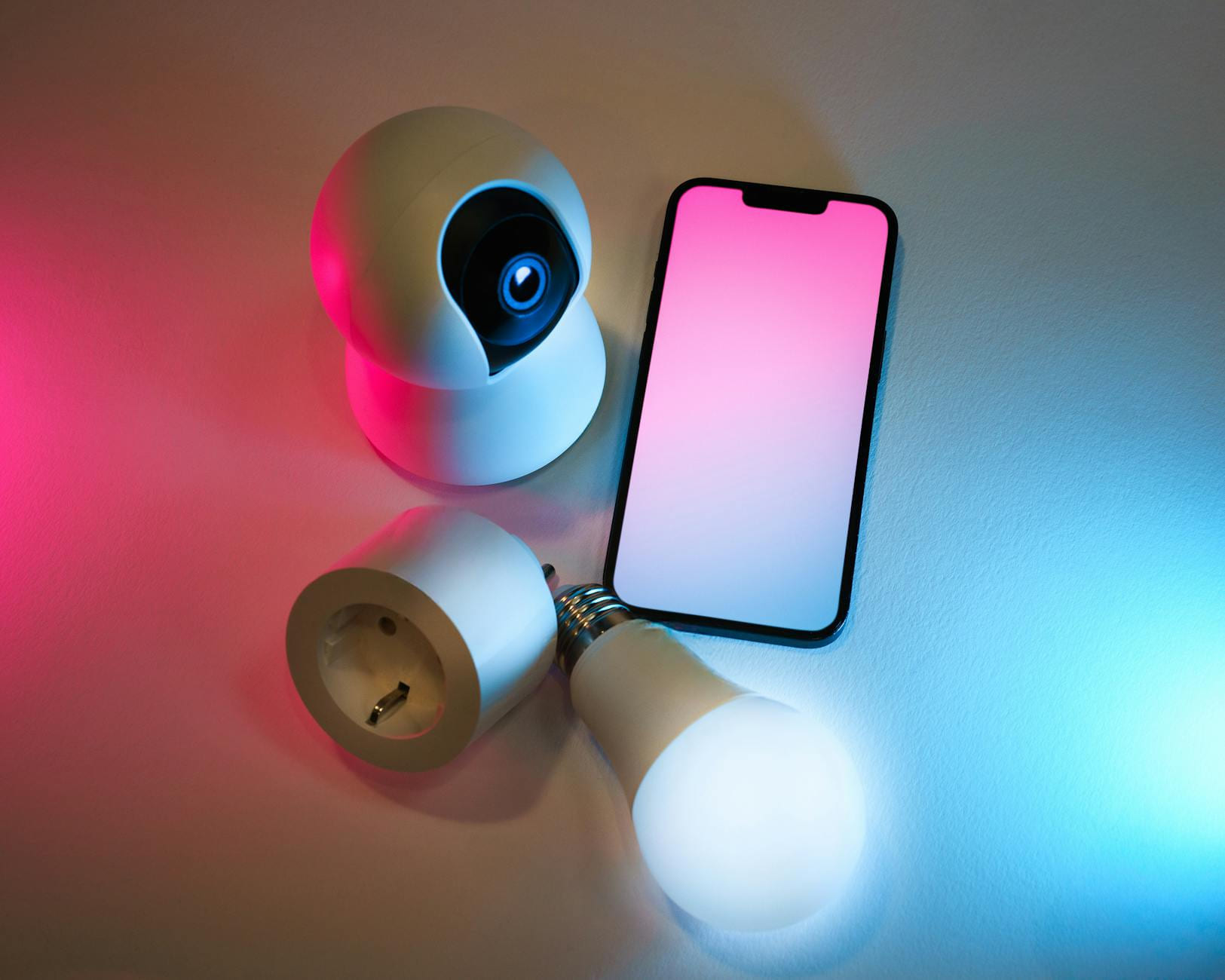 Explore smart home essentials: a smart camera, light bulb, and mobile app control. on Affordable Smart Living