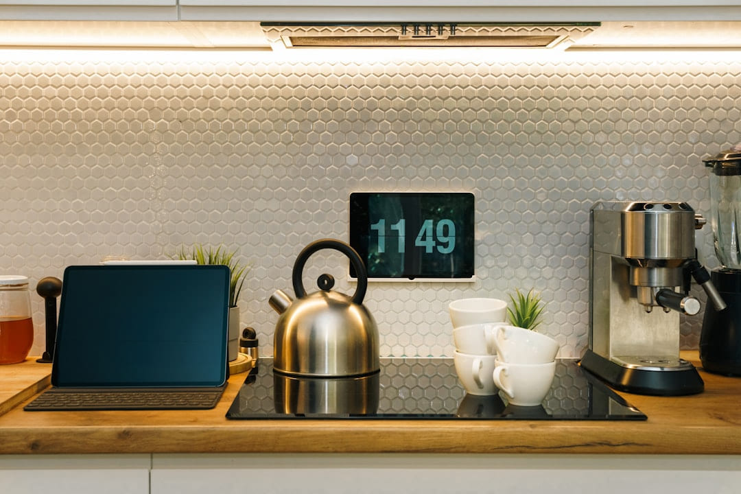 A modern kitchen with various electronic devices. on Affordable Smart Living