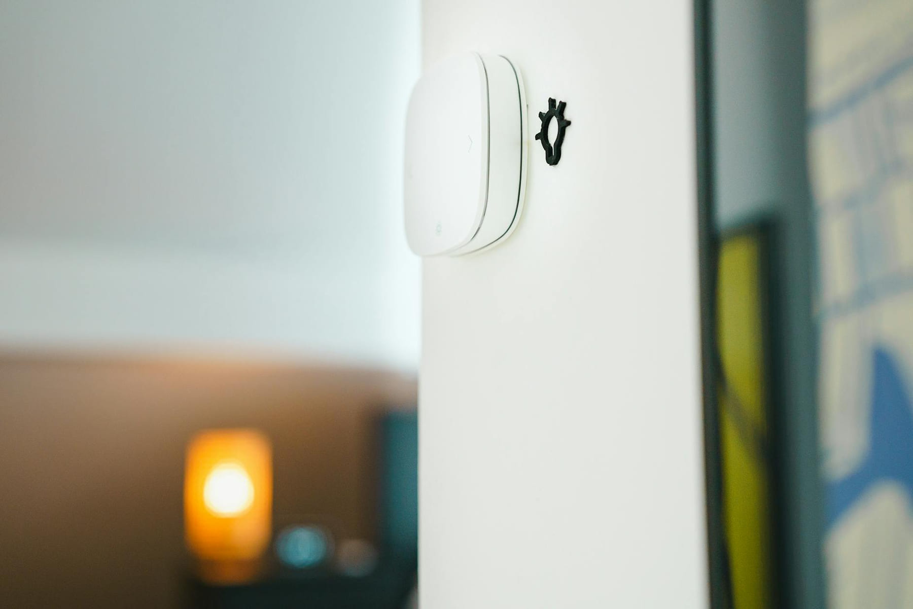 A sleek smart home light switch installed on a wall, showcasing modern technology in living spaces. on Affordable Smart Living