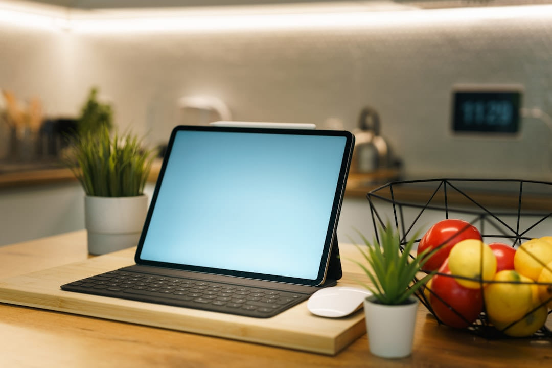 A tablet sits on a kitchen counter. on Affordable Smart Living