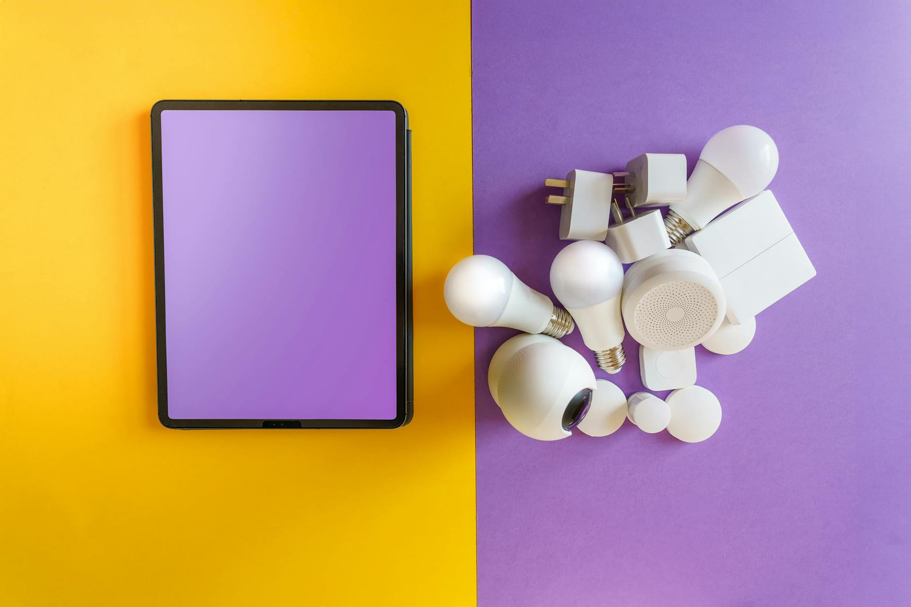 A collection of smart home devices beside a blank tablet on yellow and purple background. on Affordable Smart Living